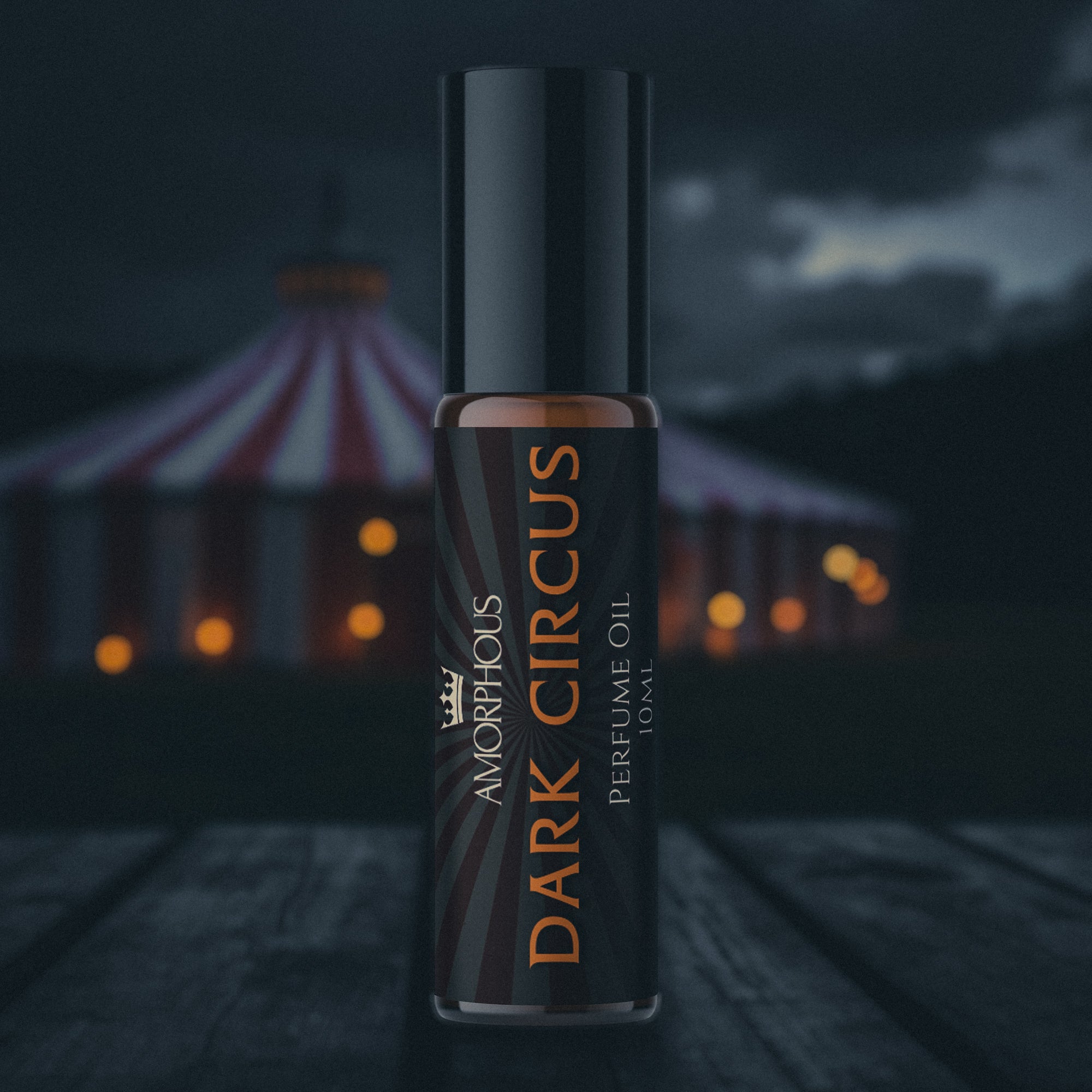 Perfume oil bottle labeled 'Dark Circus' with a circus tent in the background